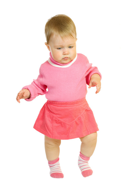 First steps of small baby in red dress - Φωτογραφία, εικόνα