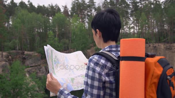 Backpacker planning stroll. - Footage, Video