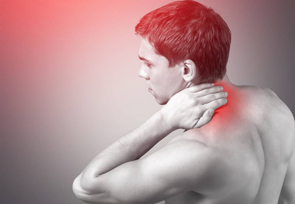 Strong man with neck pain - Photo, Image