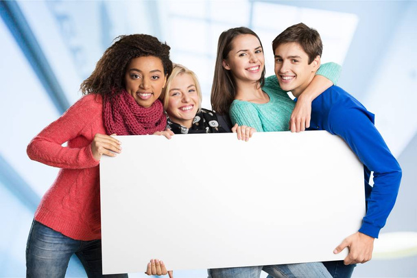 Teens holding blank banner - Foto, Imagem