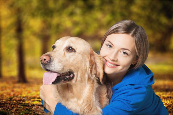 young woman with dog - Φωτογραφία, εικόνα