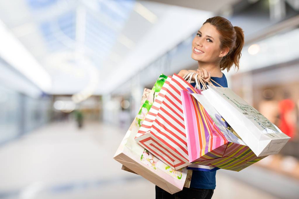 Young woman with shopping bags - Φωτογραφία, εικόνα