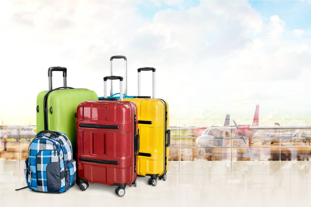 colorful suitcases and backpack  - Valokuva, kuva