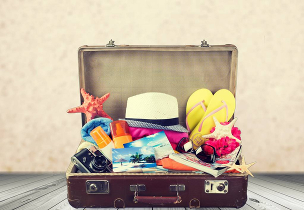 retro suitcase with travel objects - Foto, Imagem