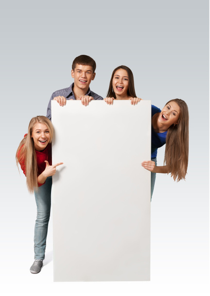 teens holding blank banner  - Foto, Imagen