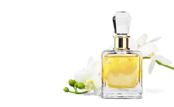Perfume bottle and flowers  - Zdjęcie, obraz