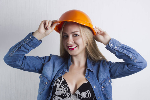Young woman in protective helmet - Foto, Bild