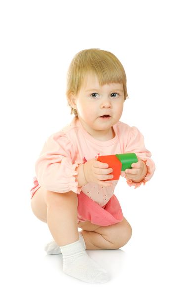 Small baby with a toys isolated - Zdjęcie, obraz