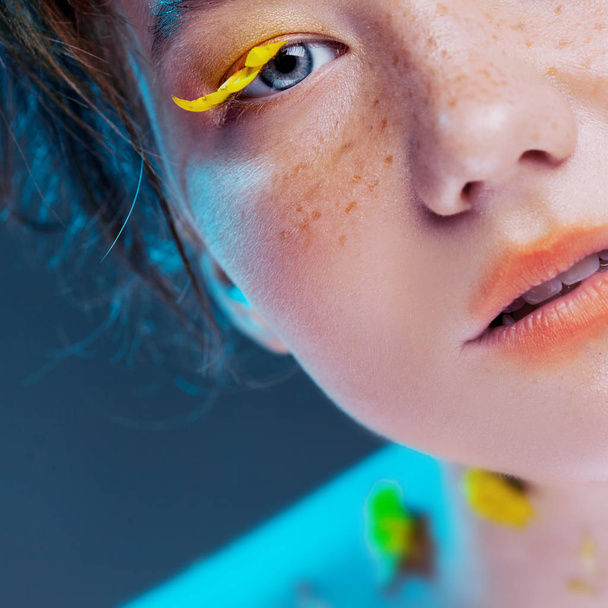 Beautiful young girl in the image of flora, close-up portrait - 写真・画像