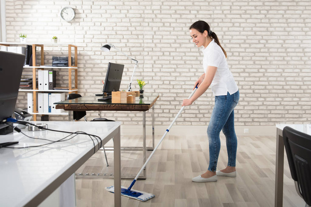 Young Woman Cleaning Floor - Fotografie, Obrázek