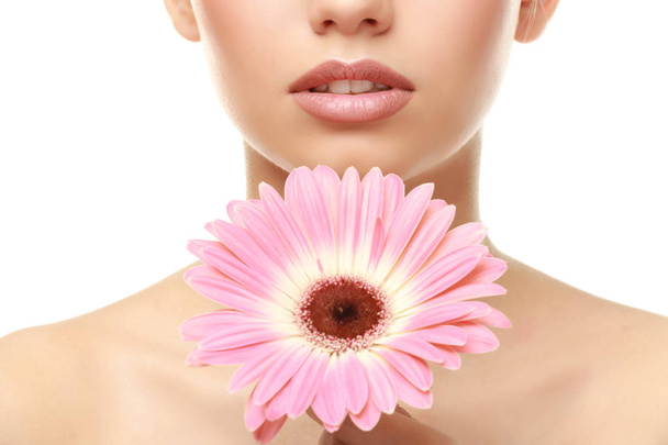 woman with lips makeup and flower   - Φωτογραφία, εικόνα