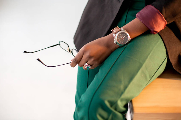 Business accessories. Glasses, watch and business clothes. - Fotó, kép
