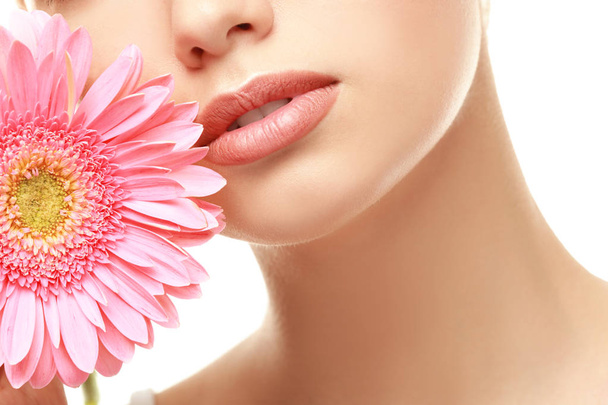 woman with lips makeup and flower   - Zdjęcie, obraz