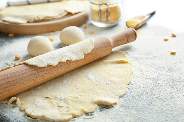 Unleavened dough for tortillas with rolling pin - Photo, Image