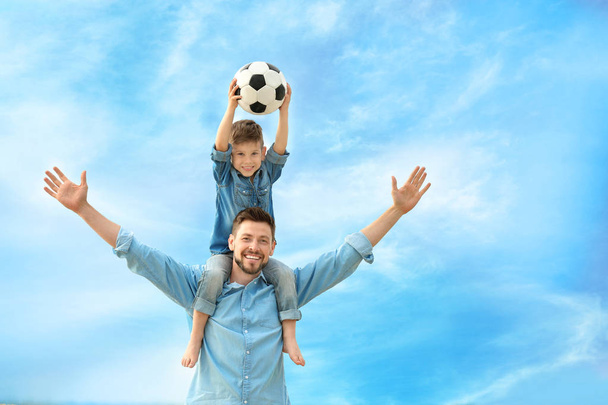 Dad and son with soccer ball  - Φωτογραφία, εικόνα