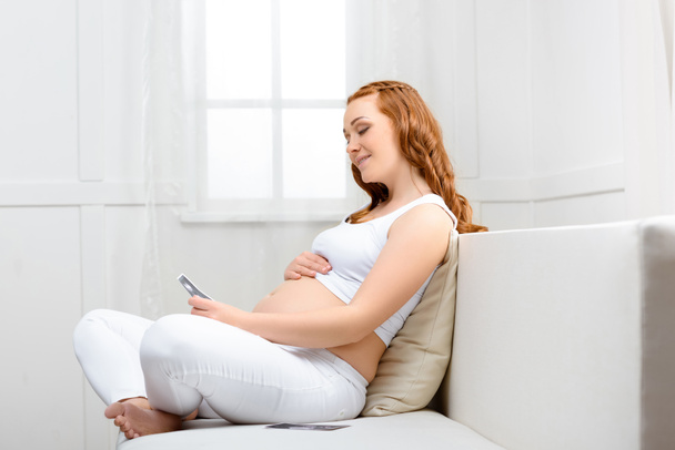 pregnant woman with ultrasound scan - Fotó, kép