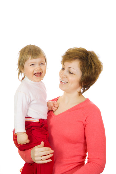 Small laughing baby in red with mother i - Foto, imagen