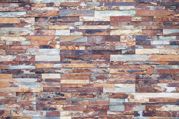 Close-up of rusty Stone. Stone Veneer for Exterior Wall Decor. - Φωτογραφία, εικόνα