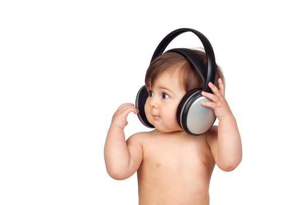 αξιολάτρευτο κοριτσάκι με μεγάλο ακουστικά - Φωτογραφία, εικόνα