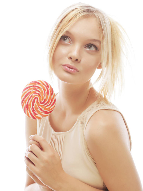 fashion blond woman  holding lollipop - Fotó, kép