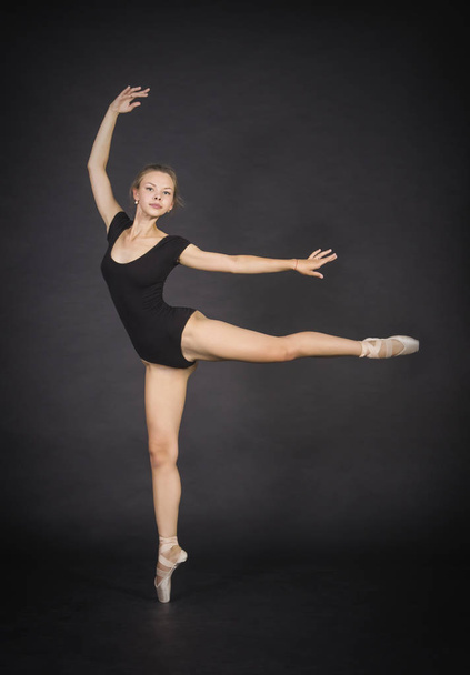 Young,smiling girl dancing the ballet. - Foto, Imagen