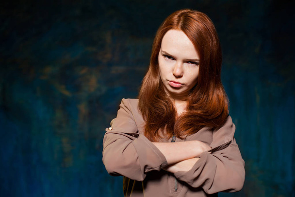 scared red-haired woman posing - Φωτογραφία, εικόνα