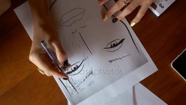 makeup artist draws on paper eyebrows - Felvétel, videó