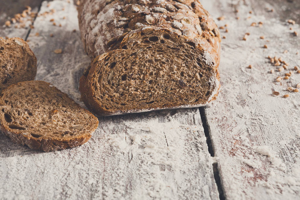Bakery concept. Plenty of sliced rye bread background - Фото, зображення