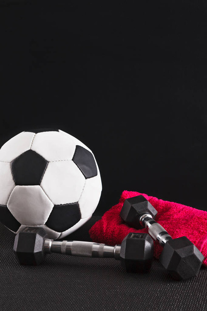 Sport equipment on black background, copy space - Photo, Image