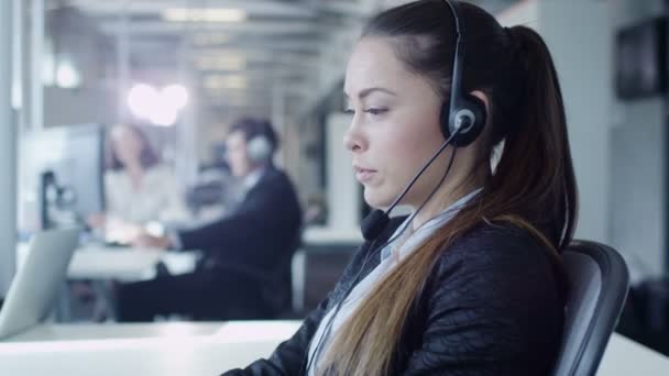 Female Customer Support Worker in Call Center.  - Materiał filmowy, wideo