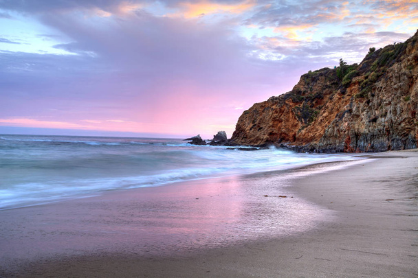 Sunset over the beach at Crescent Bay in Laguna Beach - Photo, Image