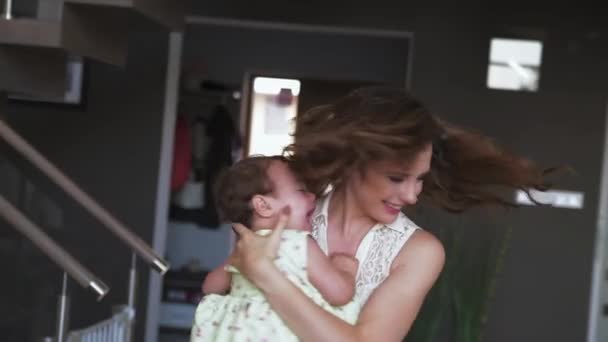 Mother and her baby having fun at home - Footage, Video