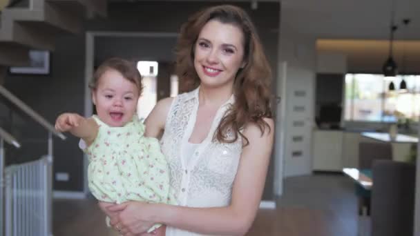 Mother and her baby having fun at home - Metraje, vídeo