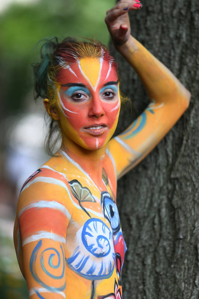 Artists paint 100 fully nude models of all shapes and sizes during 4th NYC Body Painting Day - Photo, image