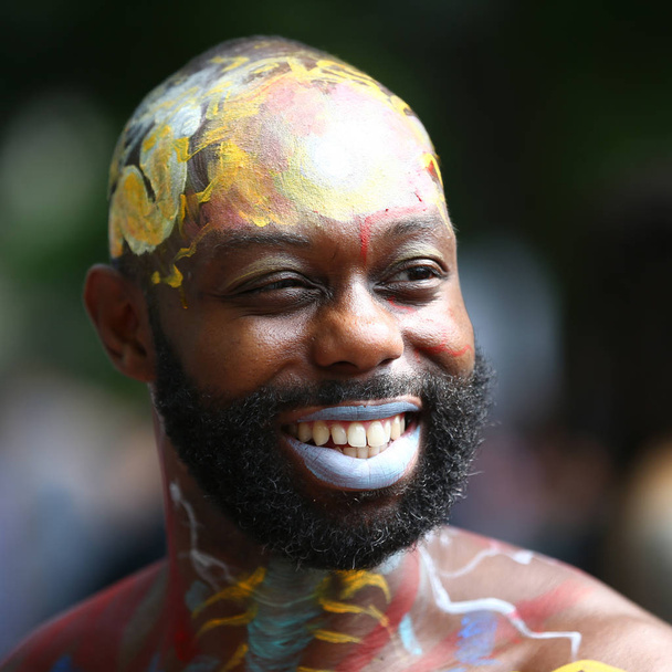Artists paint 100 fully nude models of all shapes and sizes during 4th NYC Body Painting Day - Photo, Image