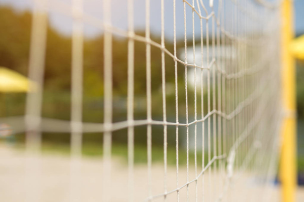 Tennis or volleyball net on a beach - 写真・画像
