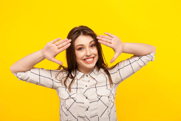Young cheerful girl in shirt  - Foto, afbeelding