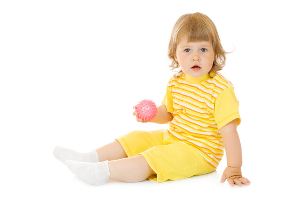 Small smiling girl with toy ball - Valokuva, kuva