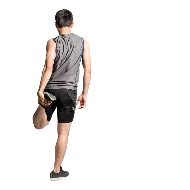 Портрет азиатского спортсмена, растягивающего свои тела перед экзером
 - Фото, изображение