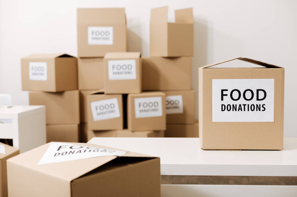 Grey boxes with food for those in need - Foto, Bild