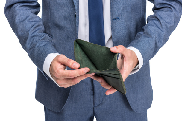 businessman holding empty wallet - Photo, Image