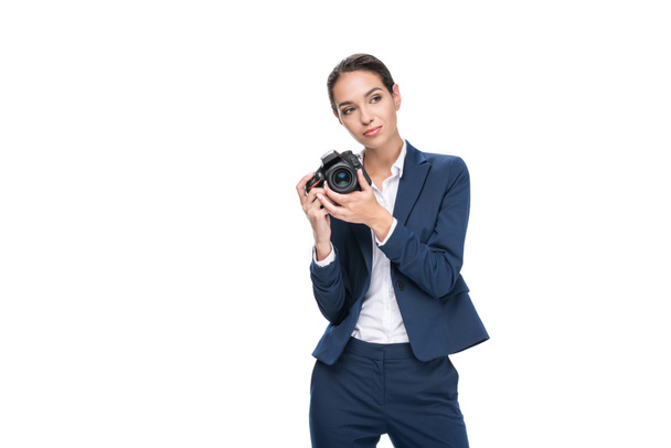 businesswoman taking photo on camera - Фото, зображення