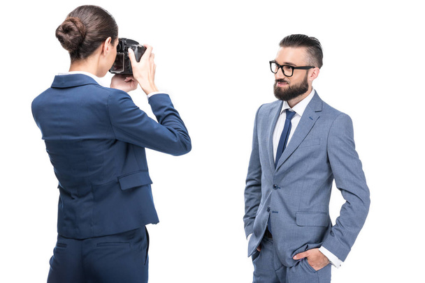 woman taking photo of businessman - Fotografie, Obrázek