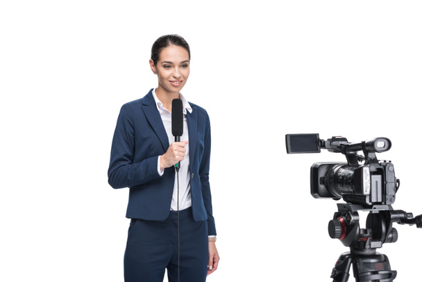 journalist with microphone looking at camera - Foto, Imagem