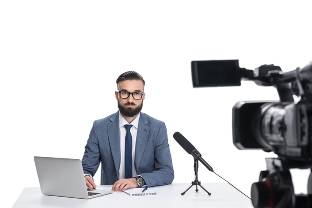 newscaster with laptop and microphone - Photo, Image