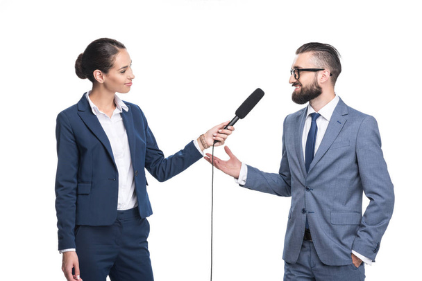 journalist interviewing a businessman - 写真・画像