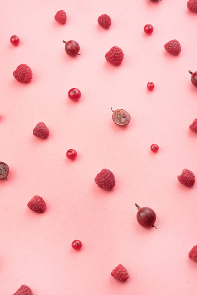 Berries isolated over pink background table. - Foto, immagini