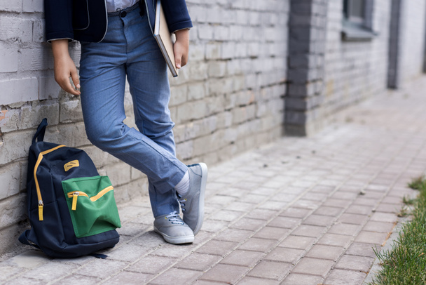 schoolboy with backpack on street - Foto, Imagem