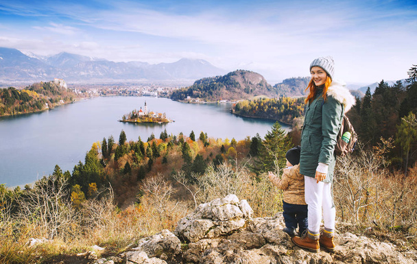Traveling family looking on Bled Lake, Slovenia, Europe  - Fotó, kép