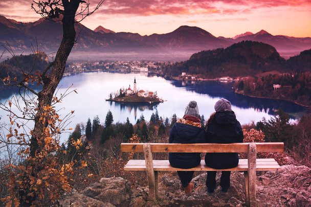 Couple of tourists travel Europe. Bled Lake, Slovenia. - Fotó, kép